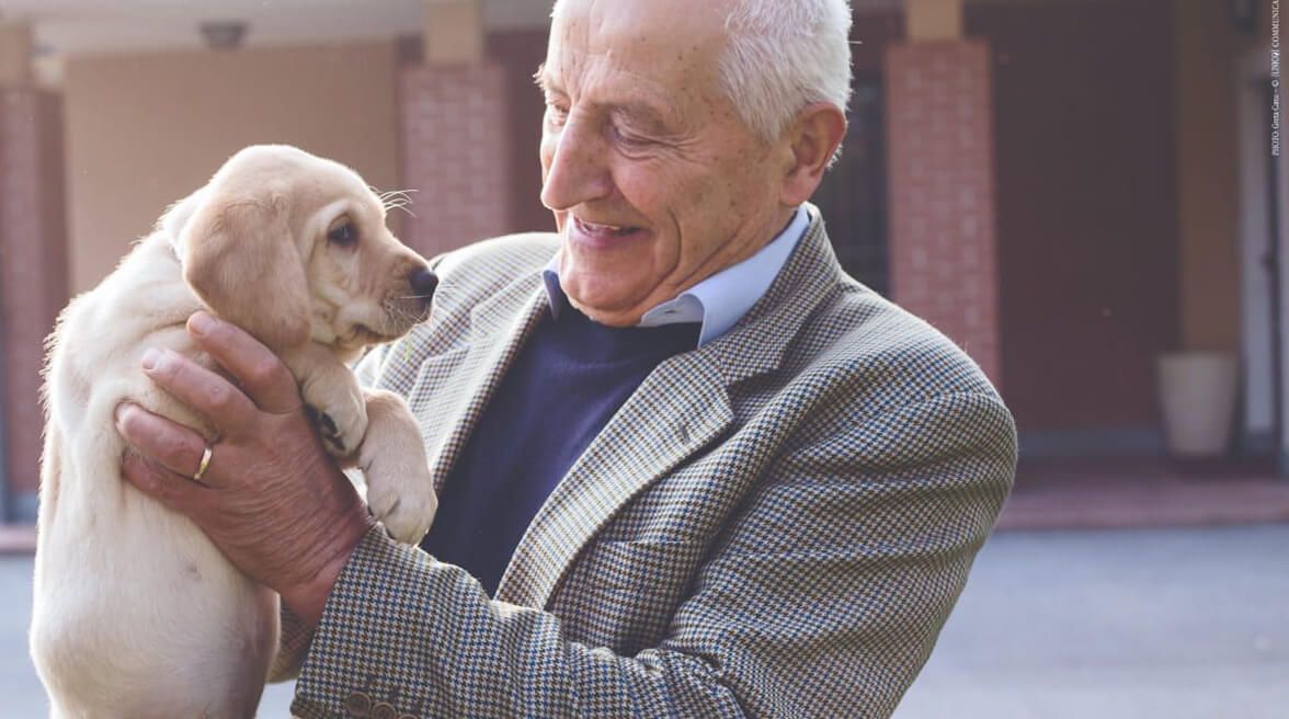 Бальдассаре Монже, основатель компании, со щенком лабрадора